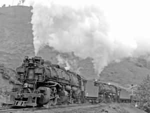 The B&O railroad back in the last days of steam. Engines like this were made specifically to haul cars up grades. 